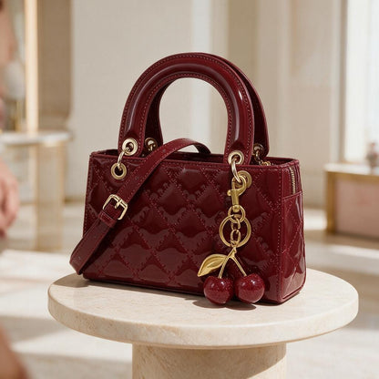 Burgundy Patent Handbag, Quilted Top Handle Purse, Cherry Charm Crossbody Bag, Red Shoulder Bag, Elegant Women’s Handbag